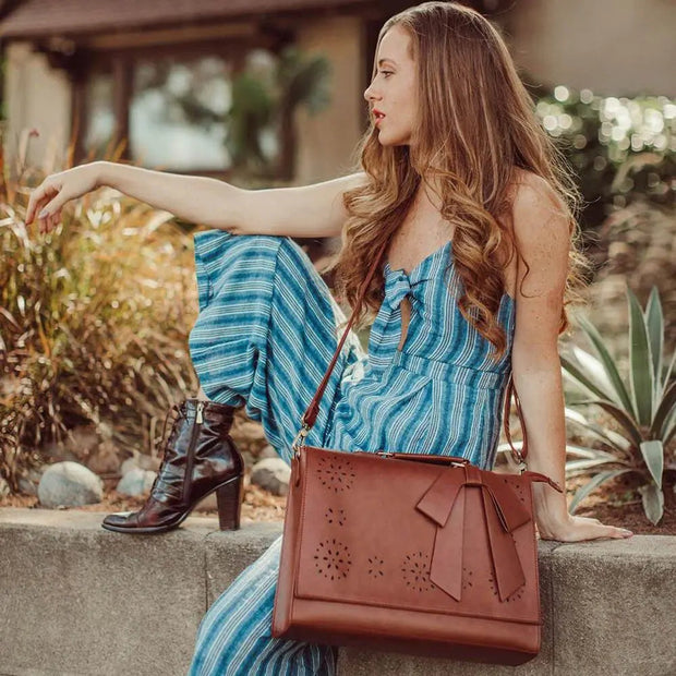 Claire’s Elegant Bow-Tie Satchel