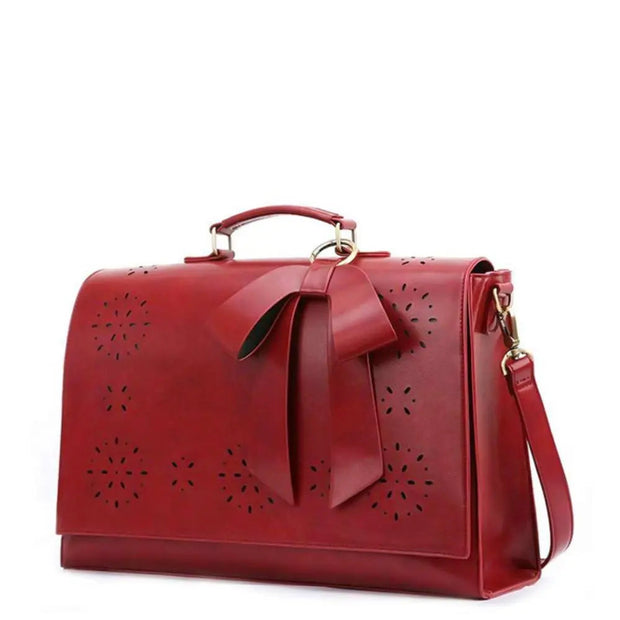 Claire’s Elegant Bow-Tie Satchel