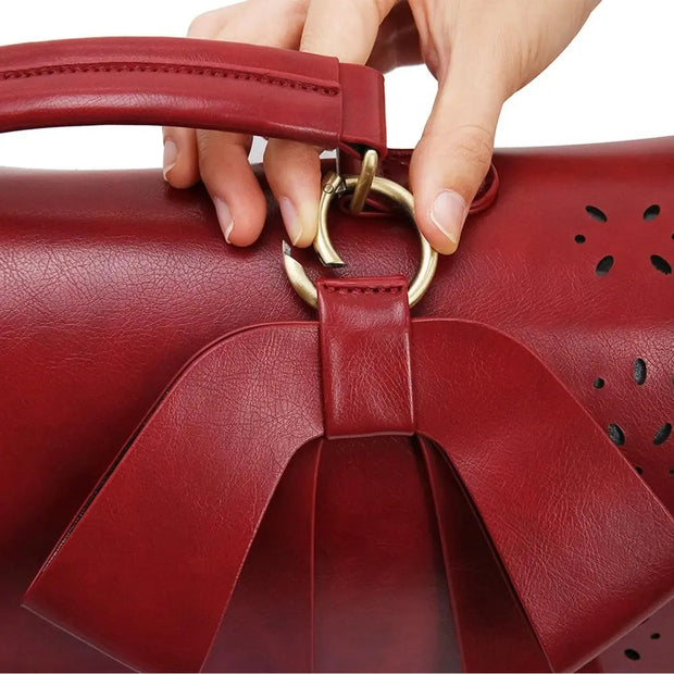 Claire’s Elegant Bow-Tie Satchel