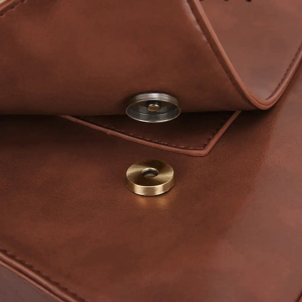 Claire’s Elegant Bow-Tie Satchel
