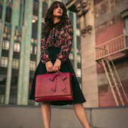 Claire’s Elegant Bow-Tie Satchel