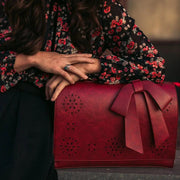 Claire’s Elegant Bow-Tie Satchel