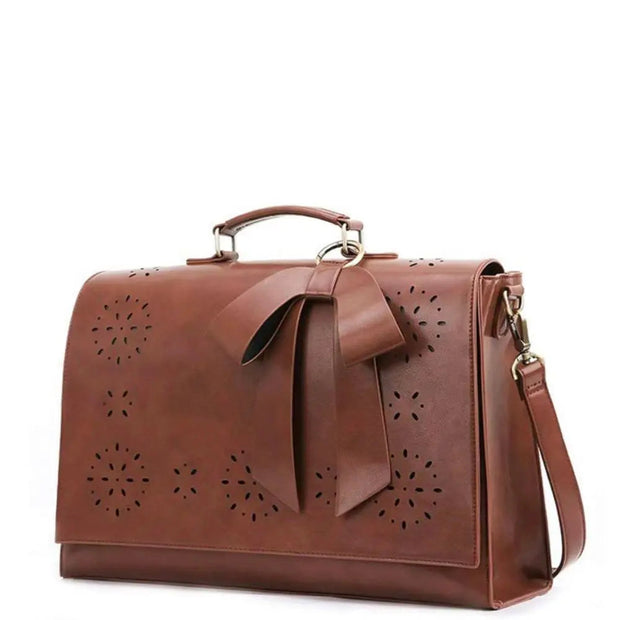 Claire’s Elegant Bow-Tie Satchel