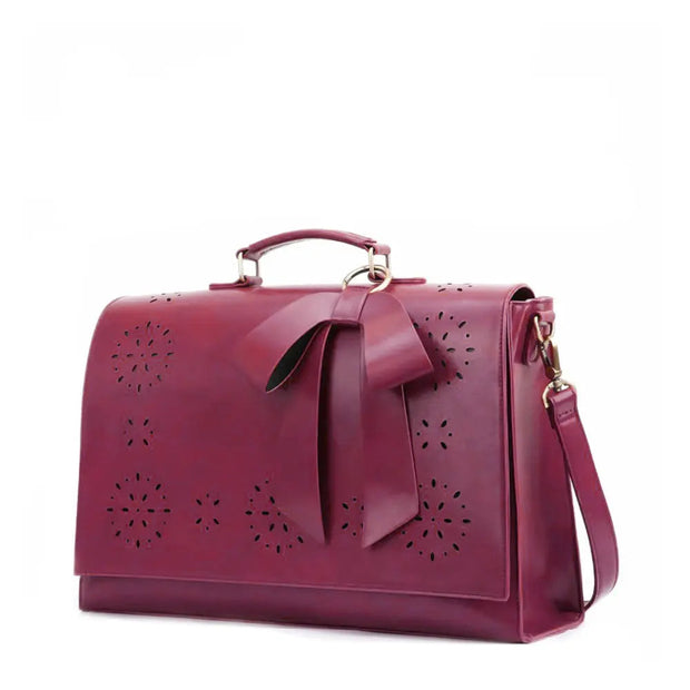 Claire’s Elegant Bow-Tie Satchel