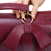 Claire’s Elegant Bow-Tie Satchel
