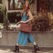 Claire’s Elegant Bow-Tie Satchel