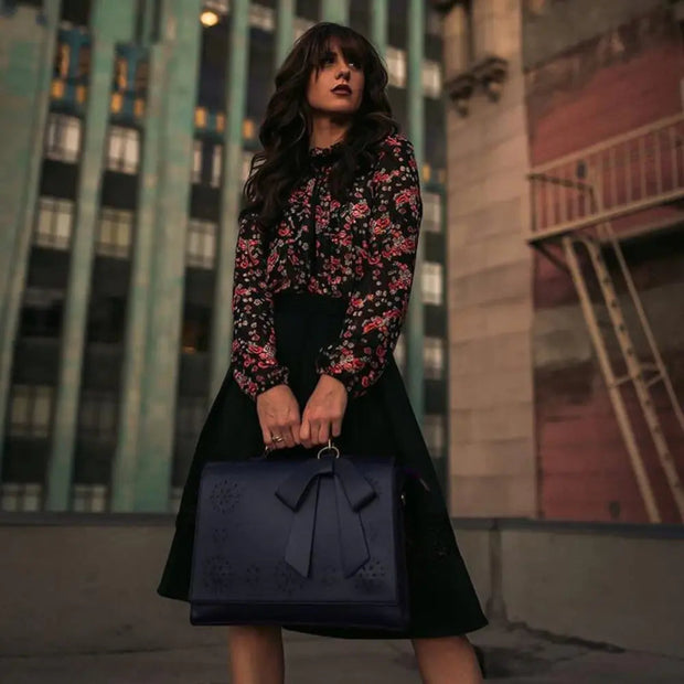 Claire’s Elegant Bow-Tie Satchel