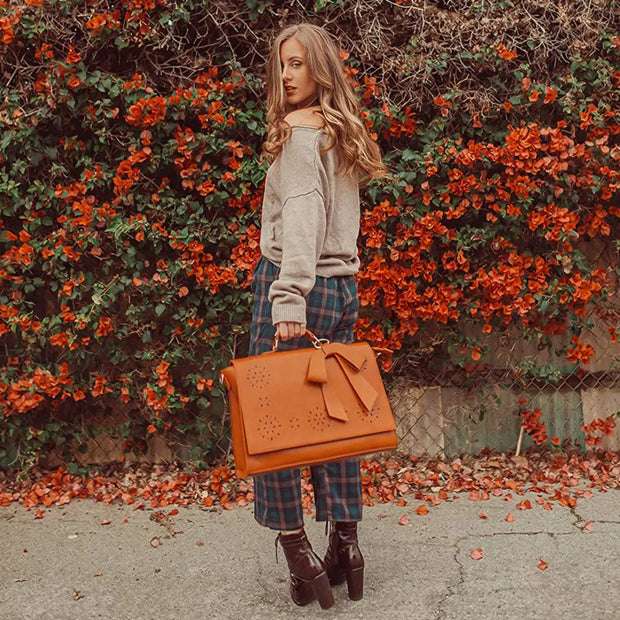 Claire’s Elegant Bow-Tie Satchel