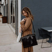 Claire’s Elegant Bow-Tie Satchel