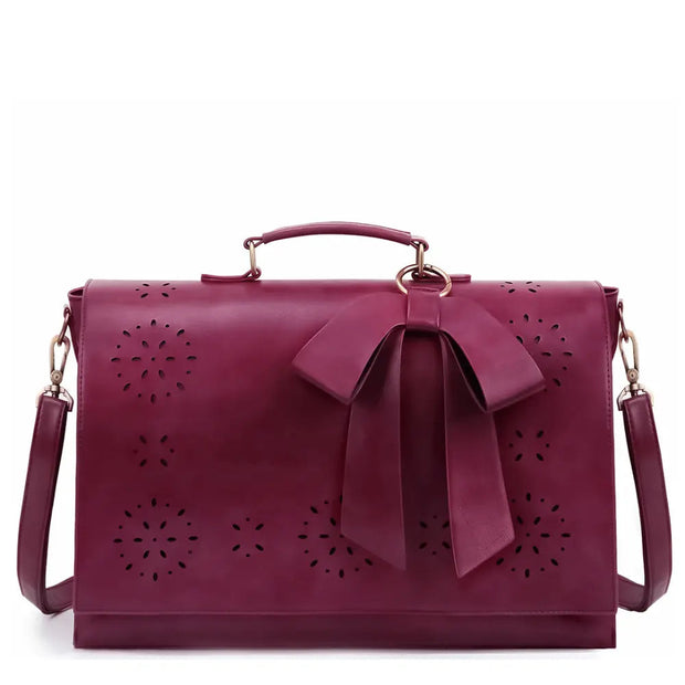 Claire’s Elegant Bow-Tie Satchel